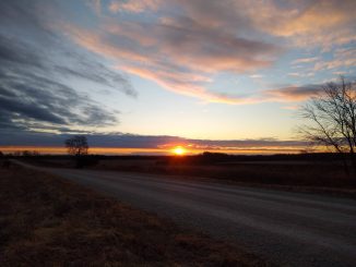 Solstice sunrise above Root River Park