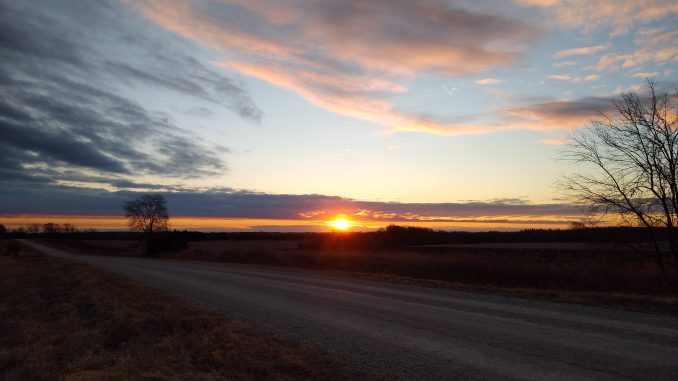 Solstice sunrise above Root River Park