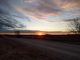 Solstice sunrise above Root River Park